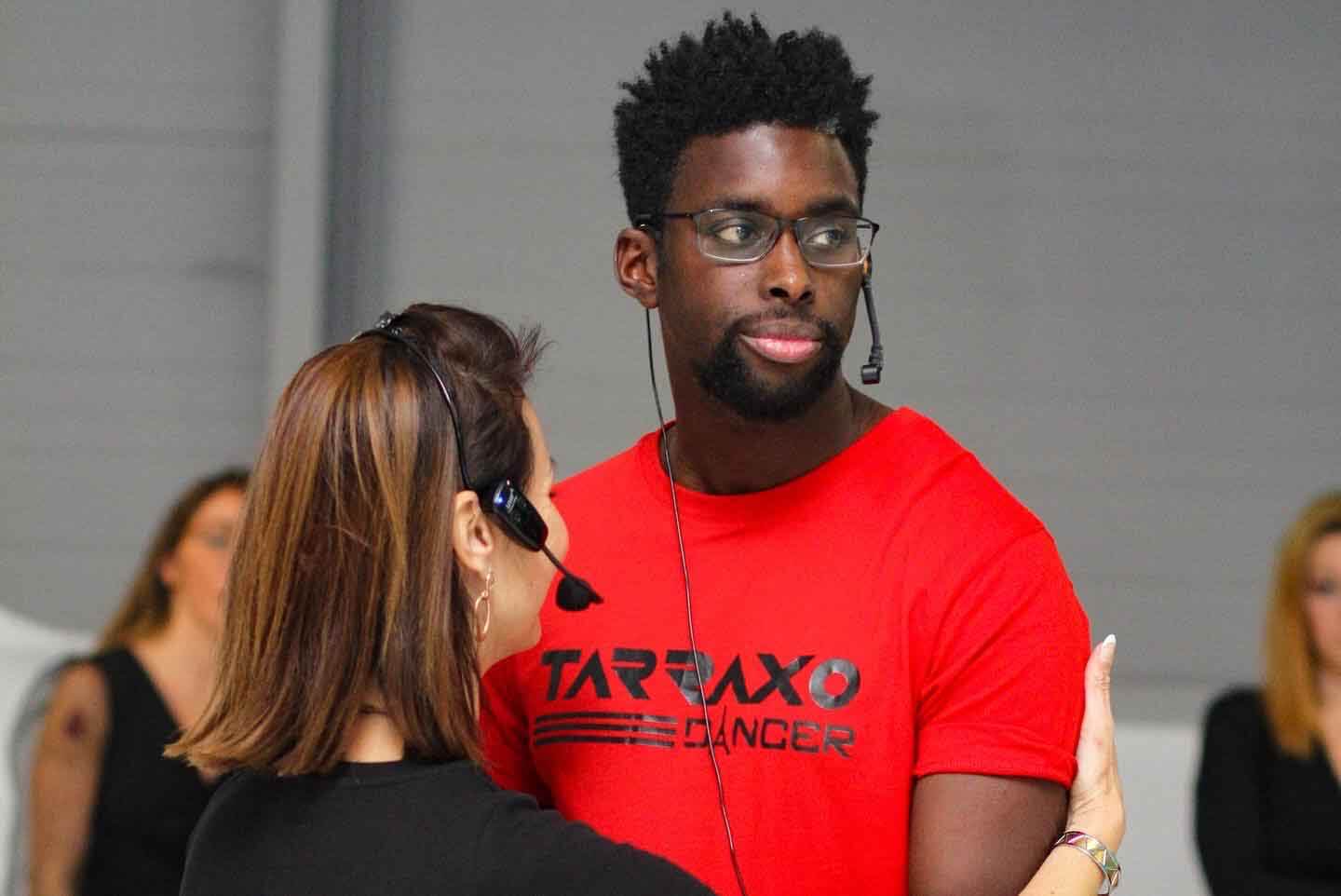 Explaining technique during a class.